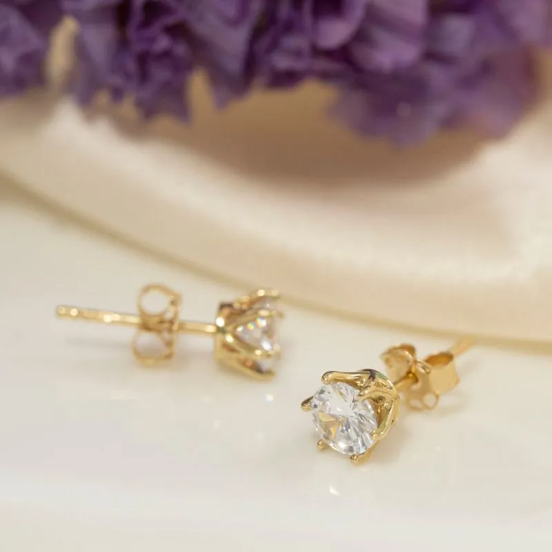 14 -Carat Gold Earrings In a 5 mm White Zircon Inlay