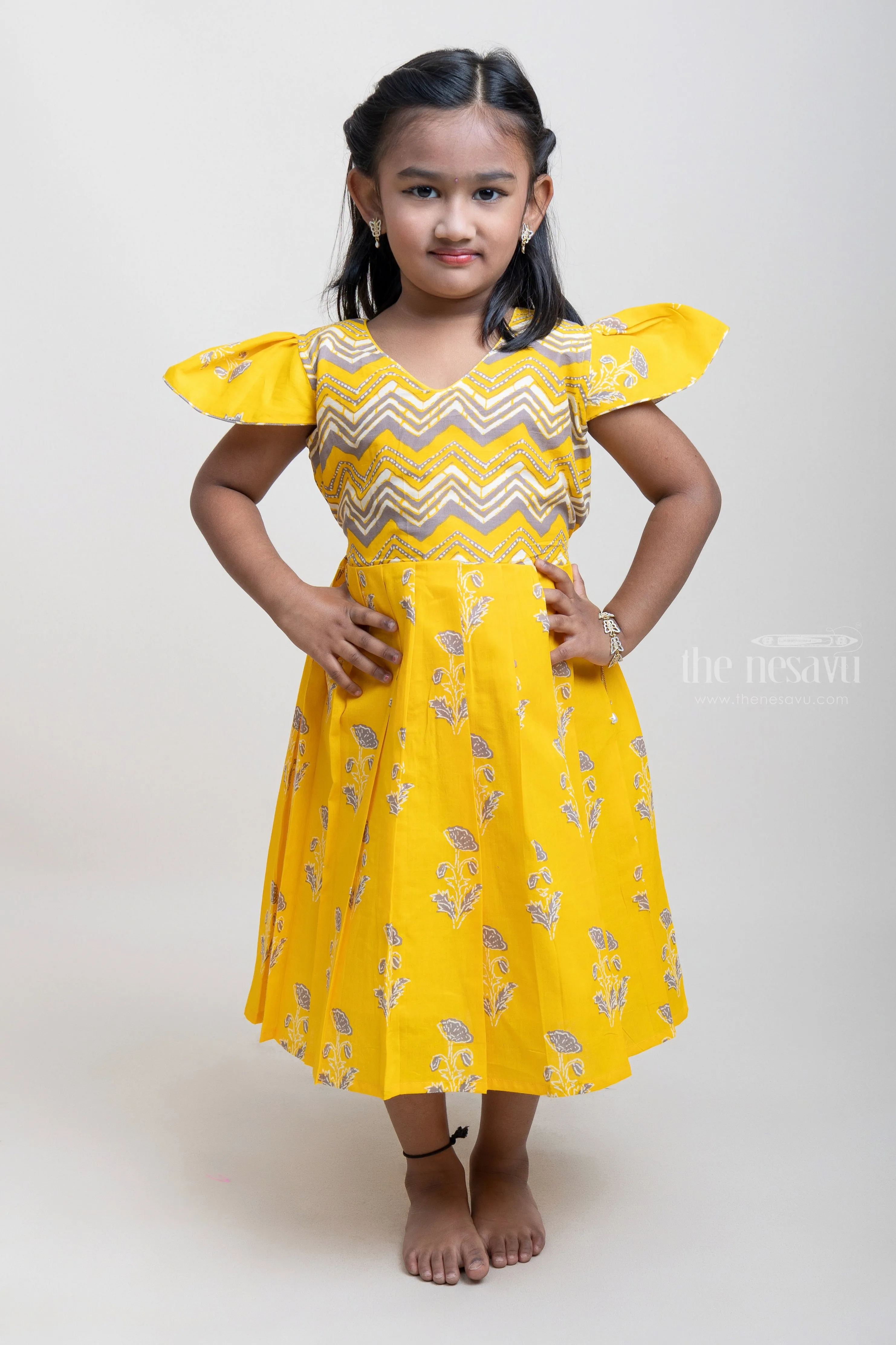 Designer Yellow Cotton Frock With Cap Sleeves For Girls