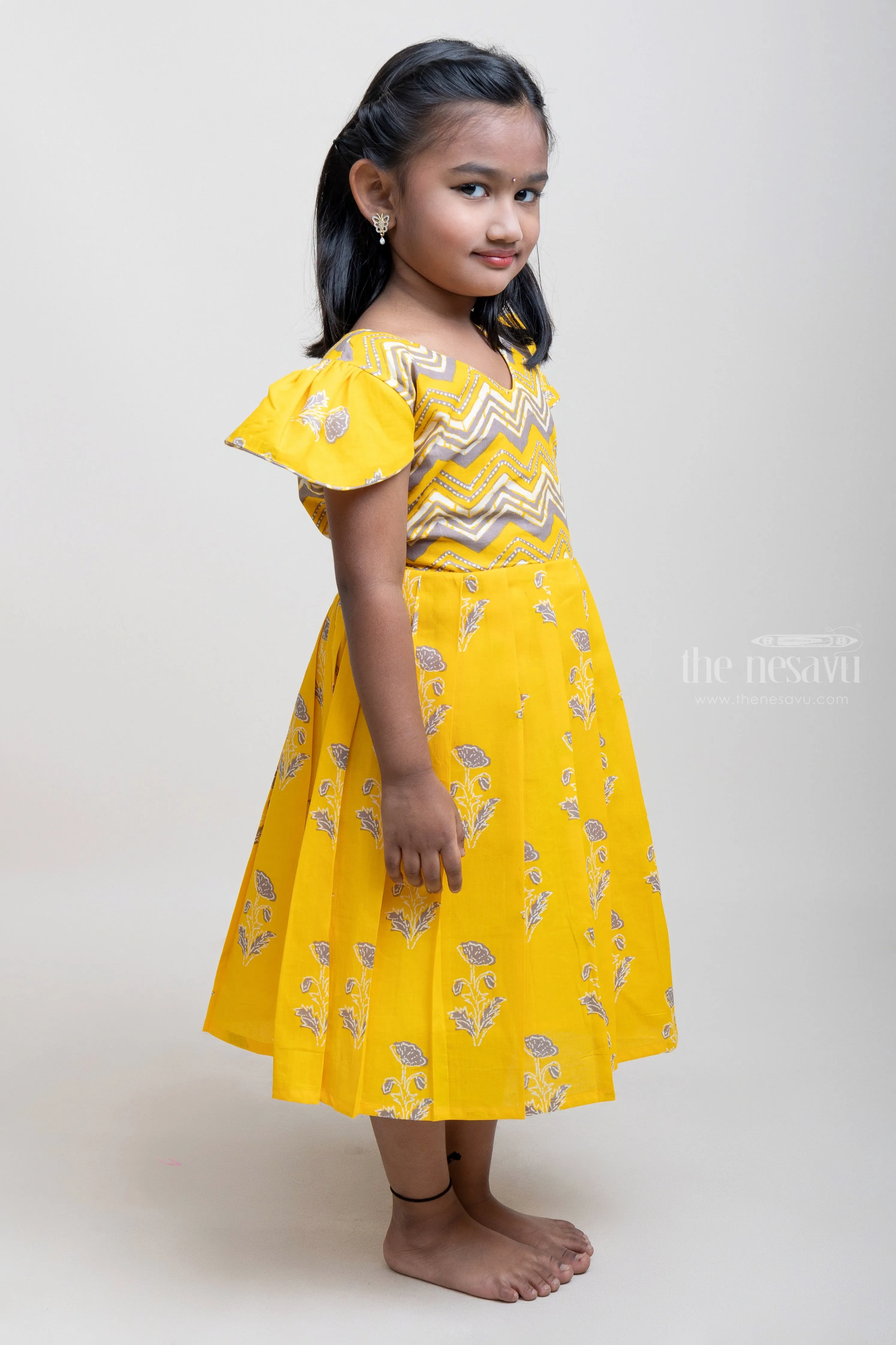 Designer Yellow Cotton Frock With Cap Sleeves For Girls